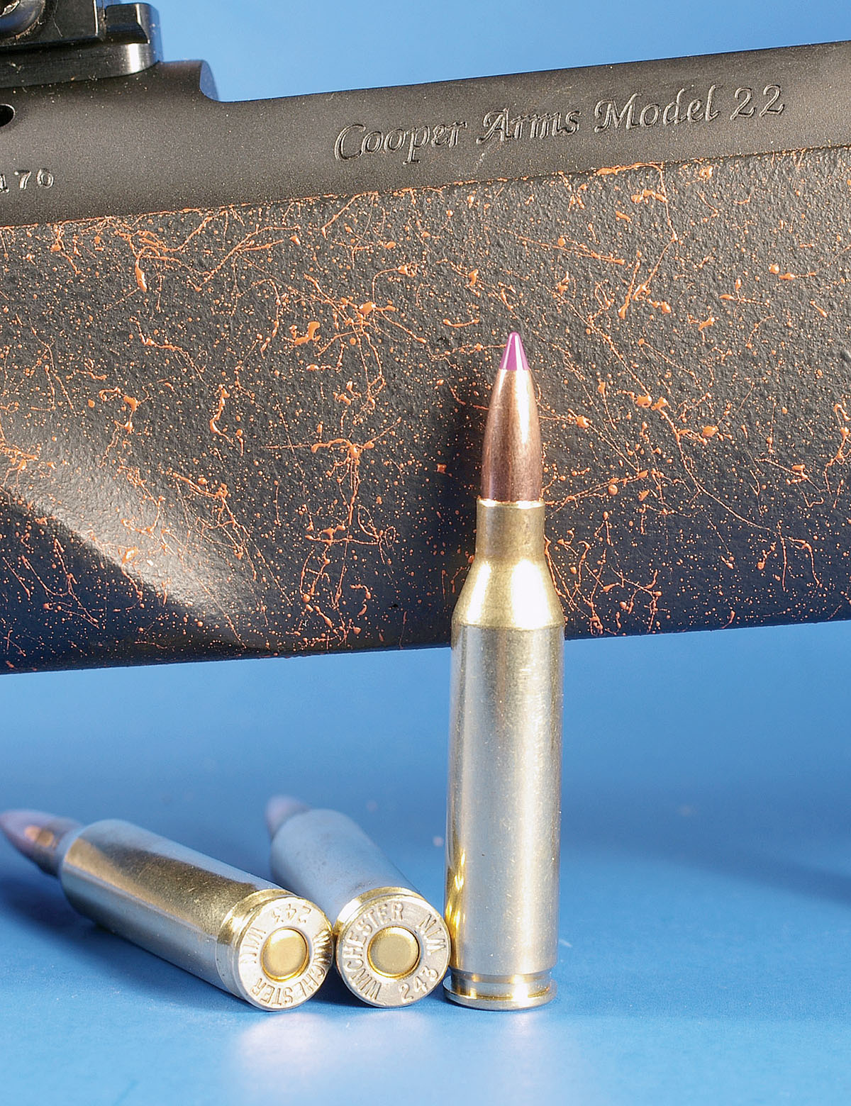 The Cooper rifle features a synthetic stock with a lightly textured surface, but not rough.